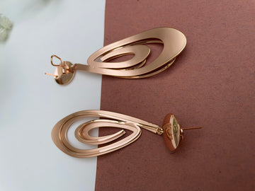 Contemporary Rose gold danglers